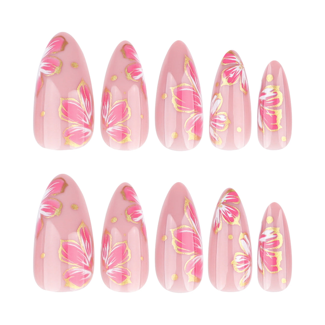 Artful nail art with elegant floral designs and gold accents Bowlift