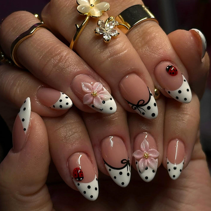 Artificial nail art with floral and playful accents Bowlift