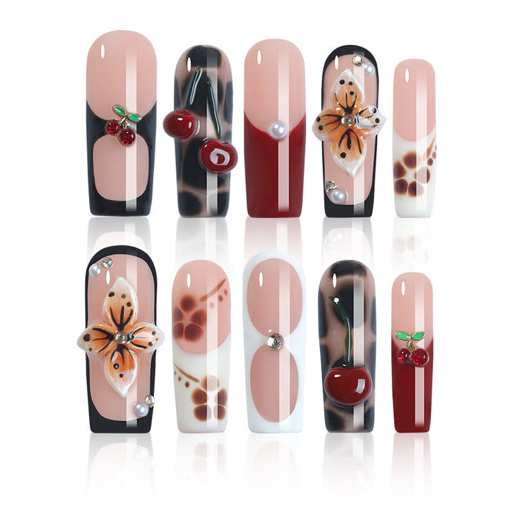 Creative nail art set with floral and fruity accents Bowlift