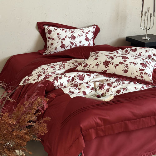 Luxurious cotton satin bedding set with floral reversible panel and ruffle Bowlift