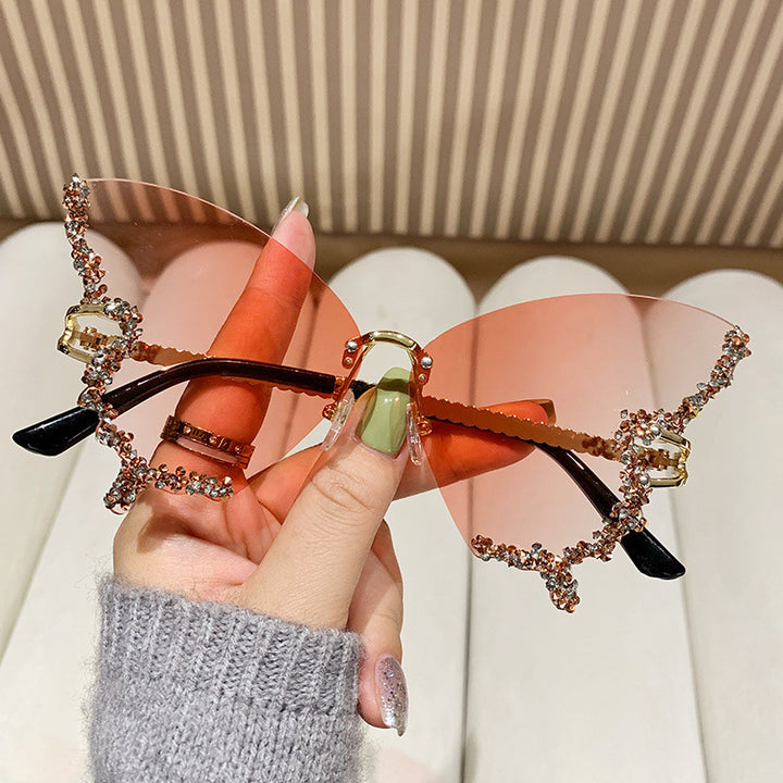 Women's extravagant sunglasses with sparkling butterfly design Bowlift