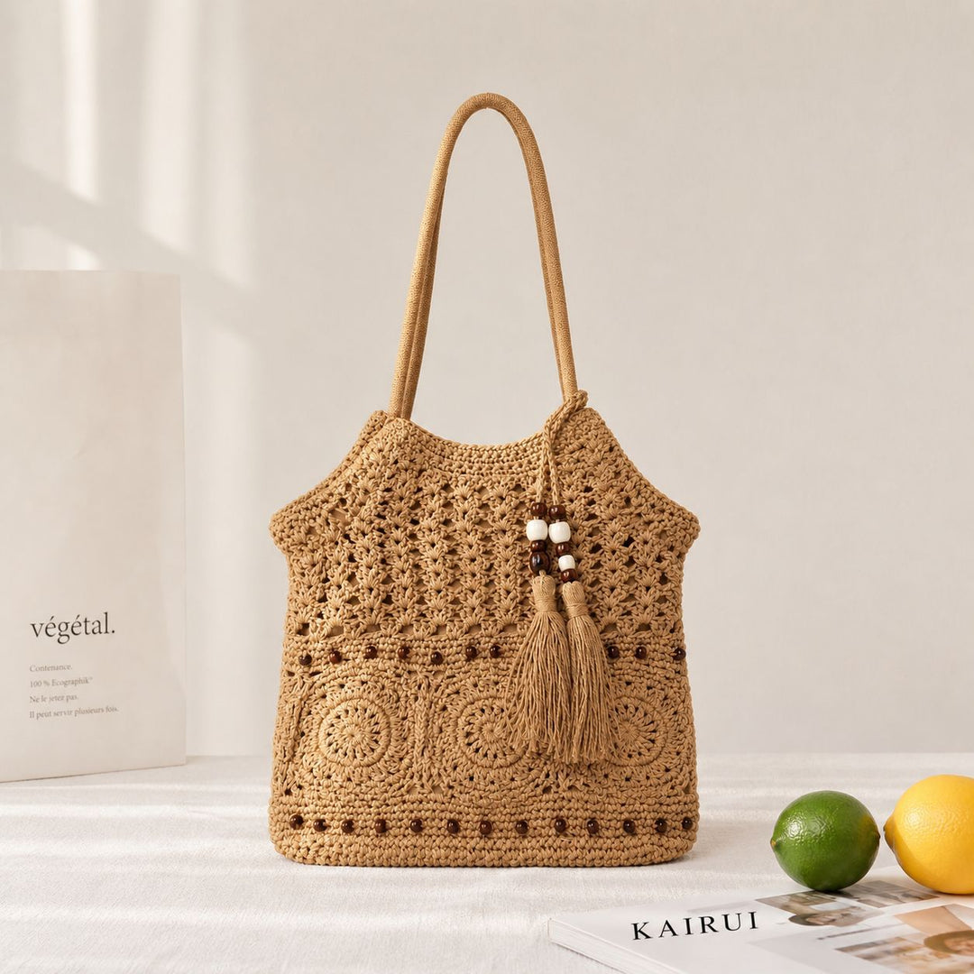 Hand-knotted shoulder bag with playful fringe design Bowlift