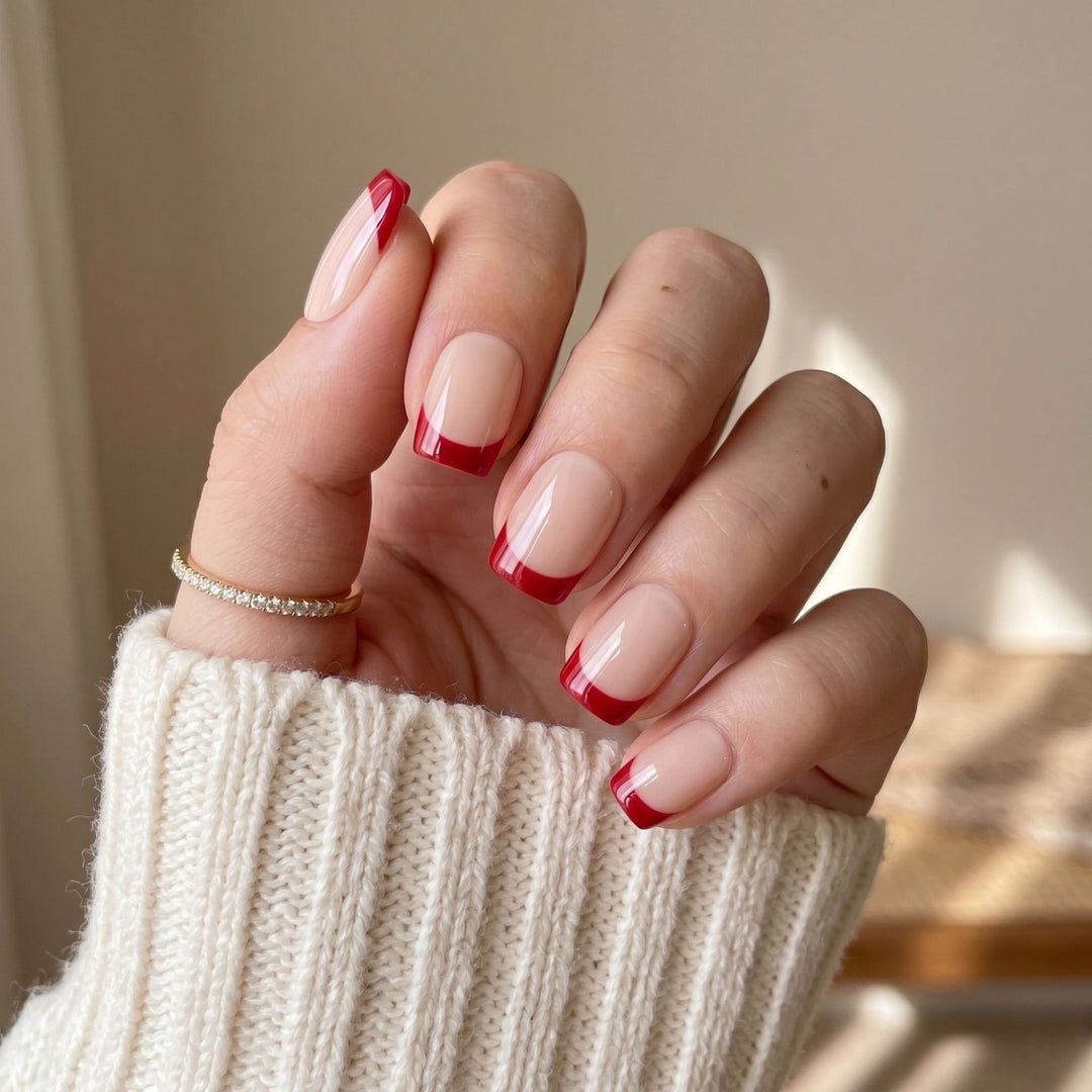 French Tip Nail Art with Elegant Red Accents Bowlift