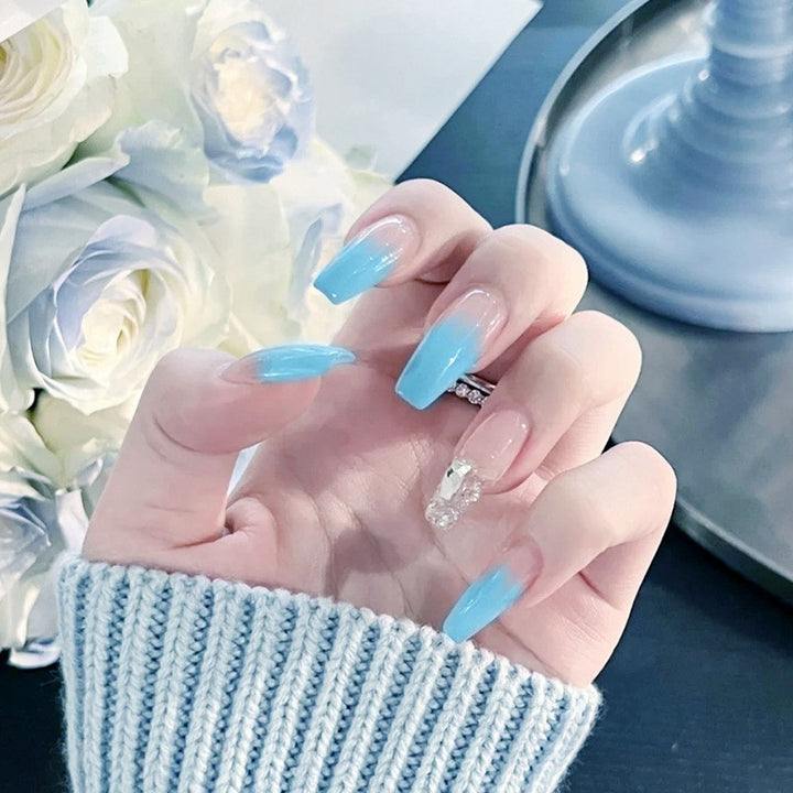 Nail set with elegant ombre and glitter accents Bowlift