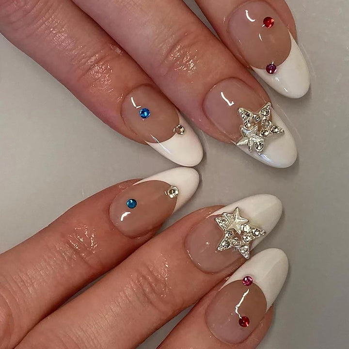 Artificial nail set with elegant French tips and sparkling accents Bowlift