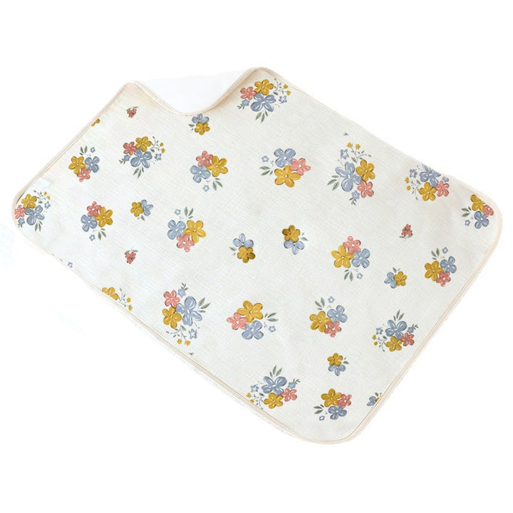 Ladies changing pad with cheerful floral pattern Bowlift