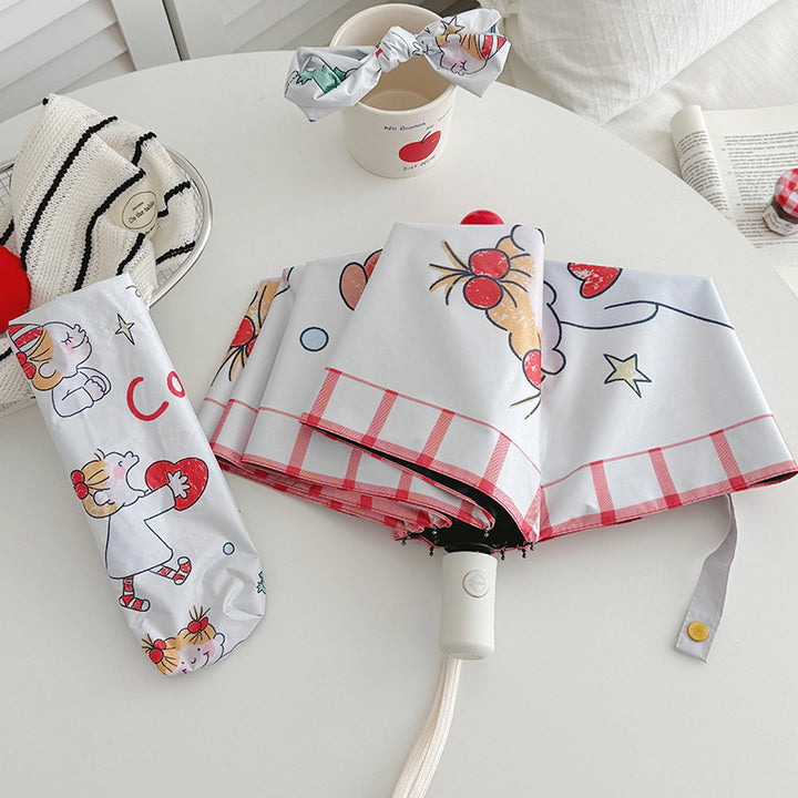 Ladies folding umbrella with playful children's motif Bowlift