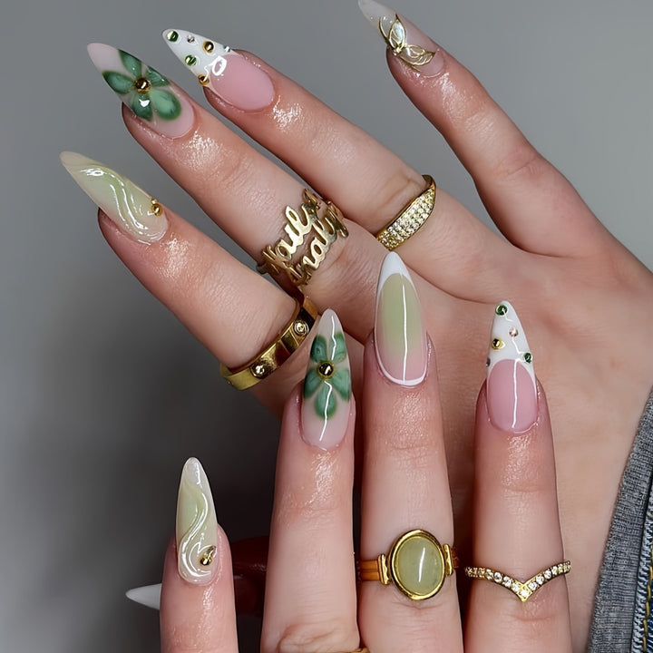 Artistic Press-On Nail Design with Floral Elements Bowlift