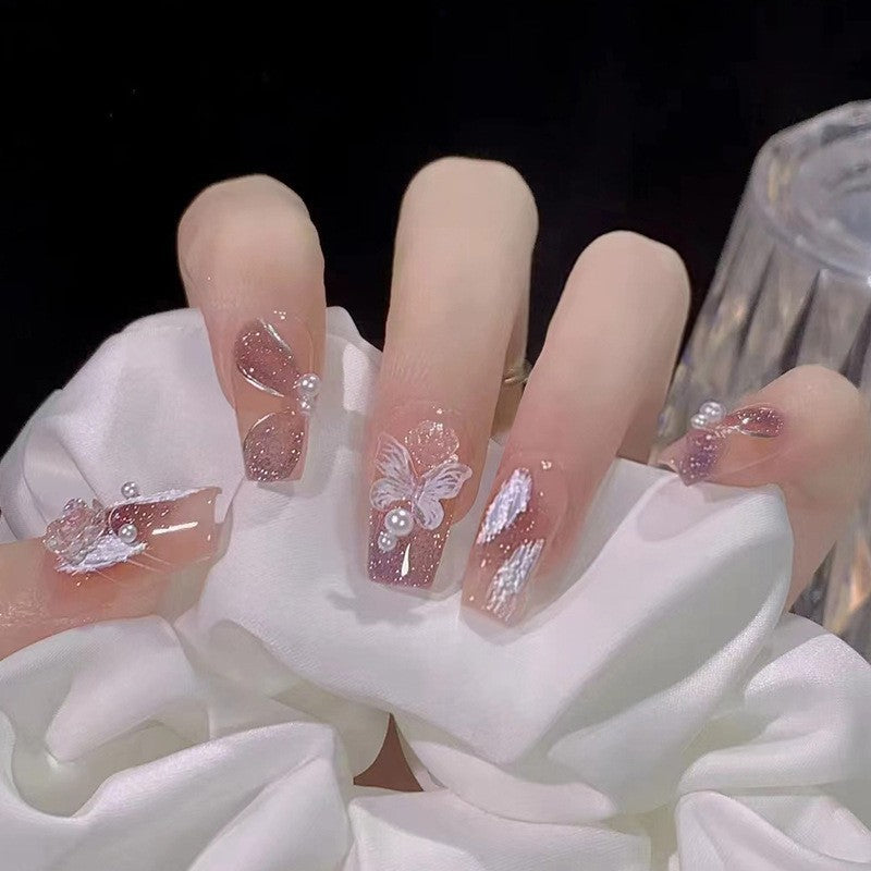 Artistic nail set with 3D flower and bow details Bowlift