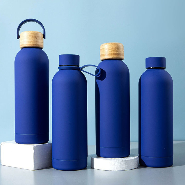 Ladies stylish stainless steel drinking bottle with innovative closure Bowlift