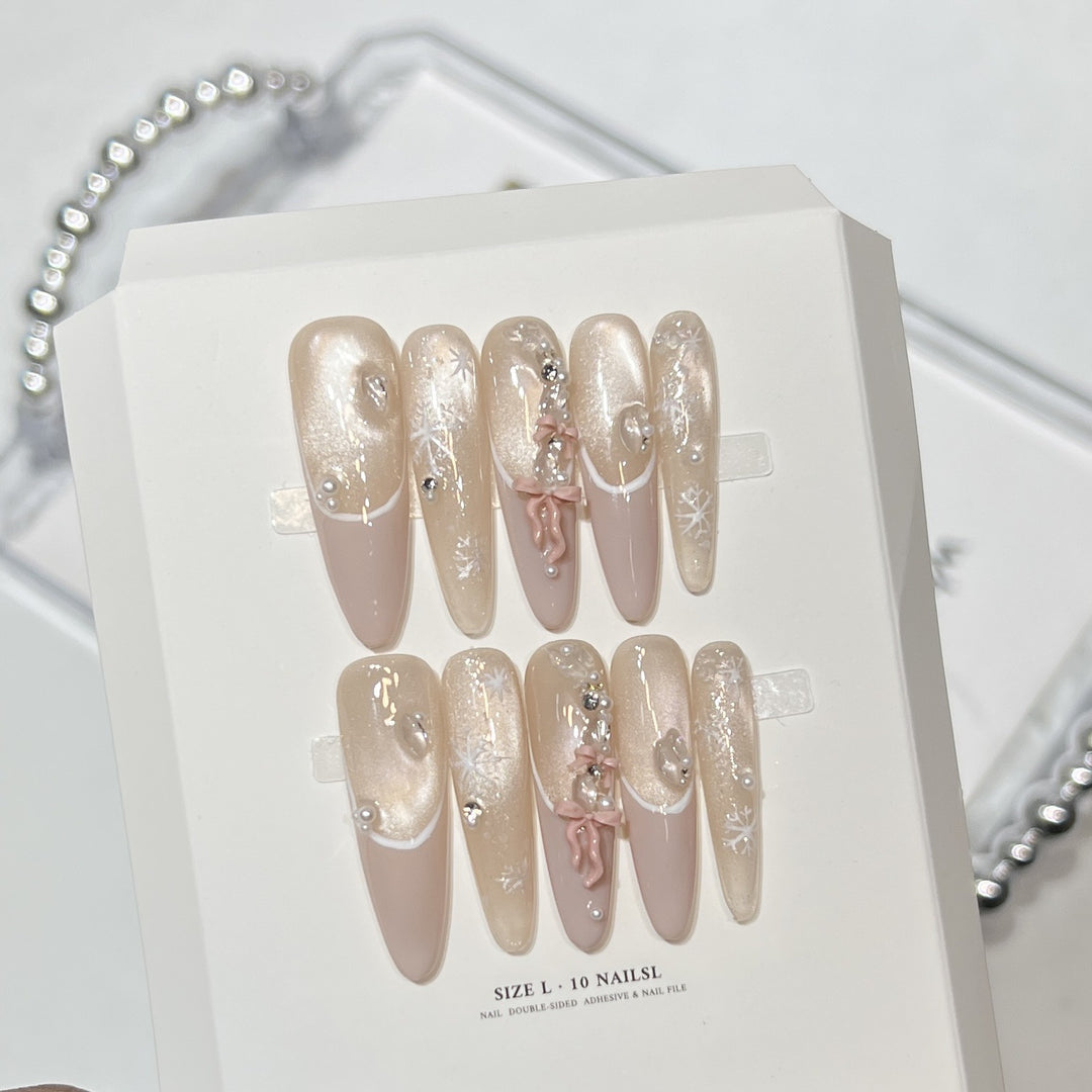 Decorative Stiletto Press-On Nail Set with Artistic Accents Bowlift