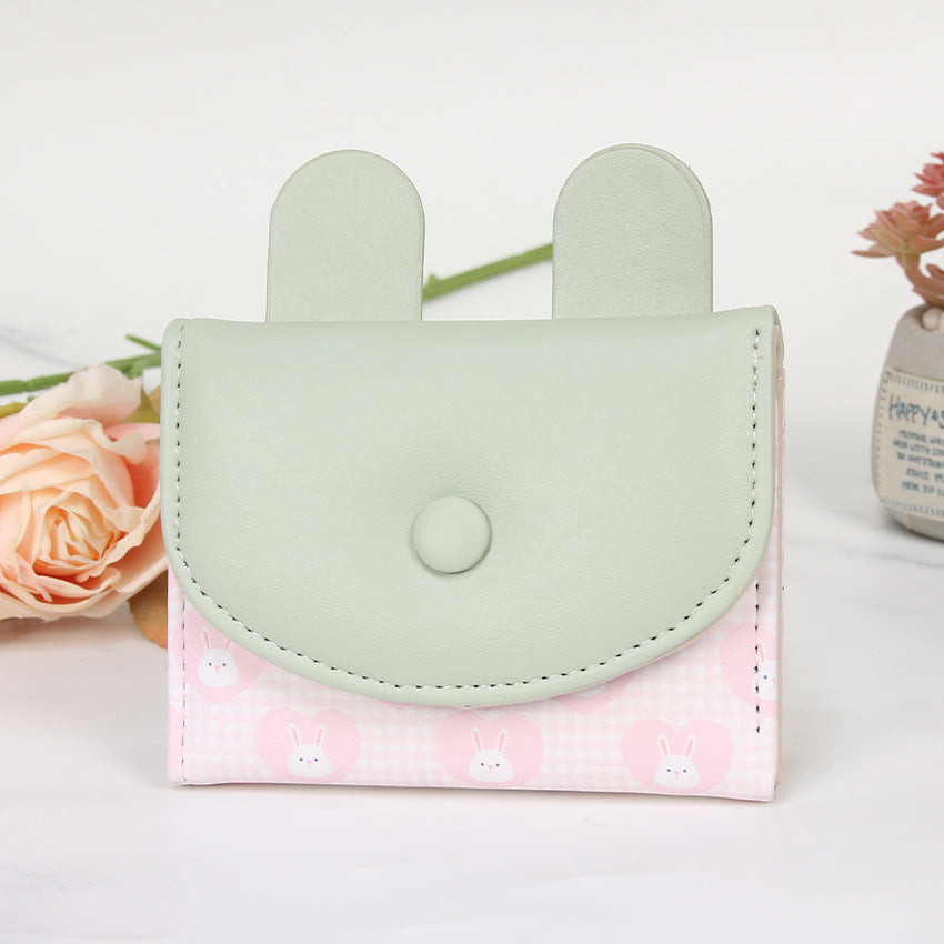 Compact rabbit-themed coin purse with snap closure and card slots Bowlift