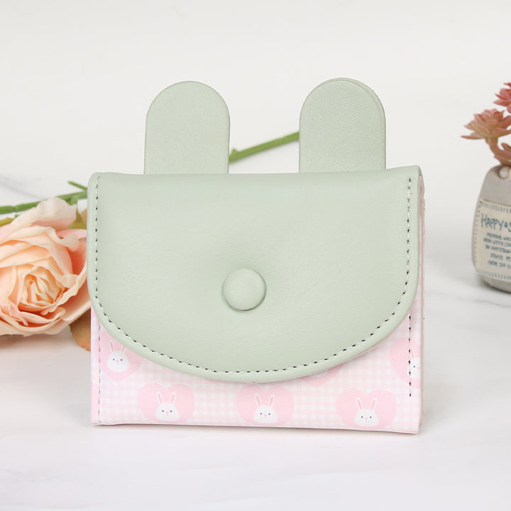 Compact rabbit-themed coin purse with snap closure and card slots Bowlift