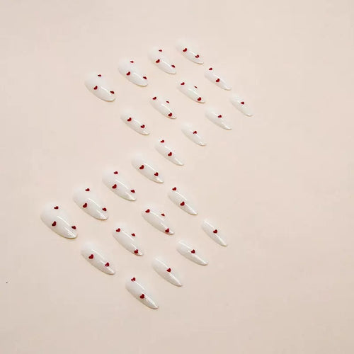 Nail set with playful heart design and elegant finish Bowlift