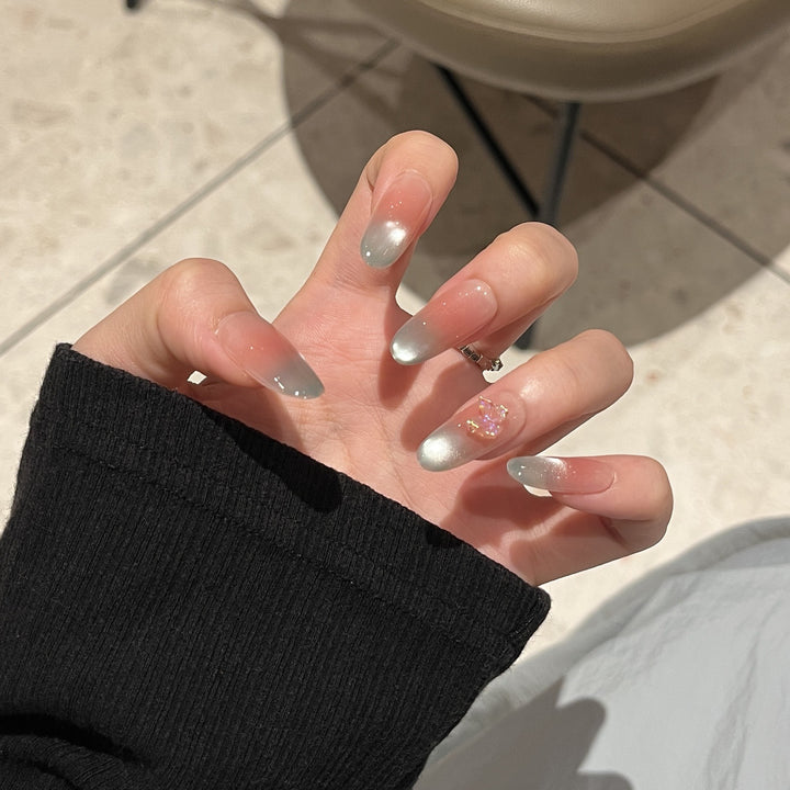 Artistic Nail Design with Decorative Elements Bowlift