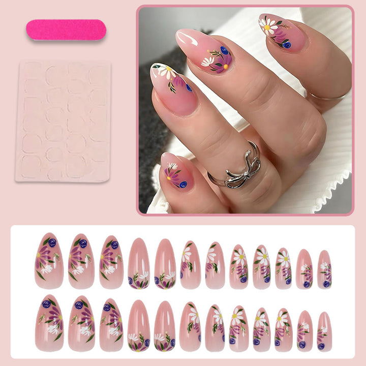 Artificial nail set with floral designs and elegant tips Bowlift