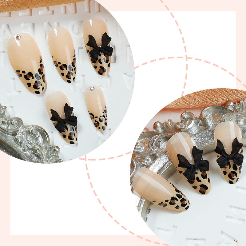 Creative nail set with leopard design and glitter accents Bowlift