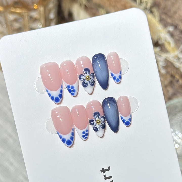 Artistic Press-On Nail Set with Floral and Geometric Accents Bowlift