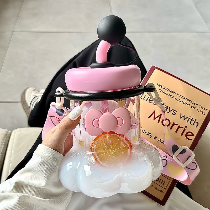 Women's water bottle with integrated silicone carrying handle and playful design Bowlift