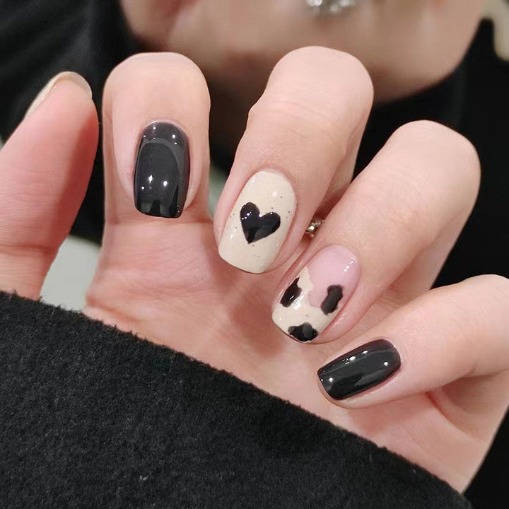 Creative nail art with heart and animal motifs Bowlift