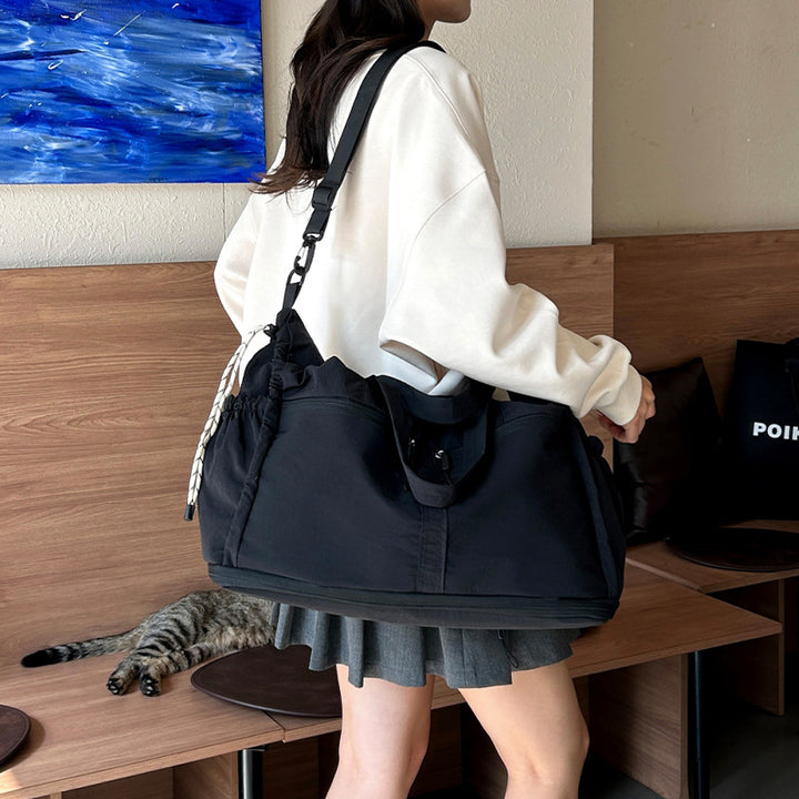 Sporty travel bag with smart organizer compartments Bowlift