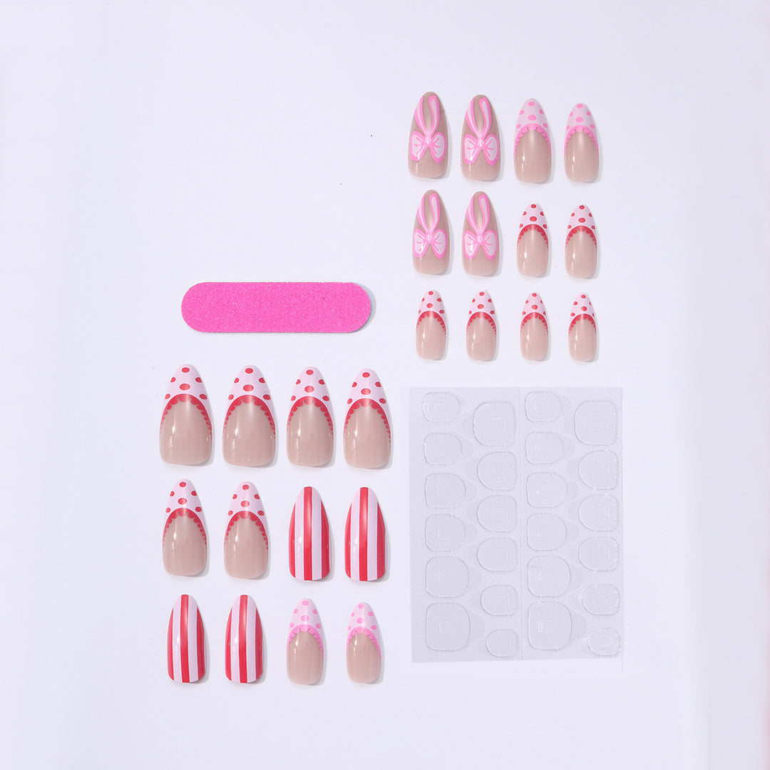 Nail set with playful bow and stripe pattern Bowlift