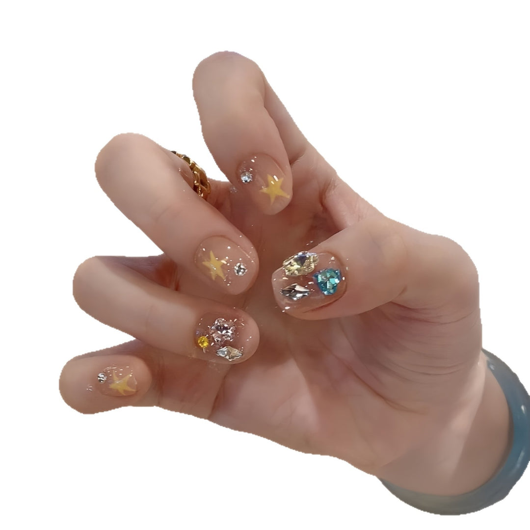 Glittering nail tips with elegant jewelry accents Bowlift