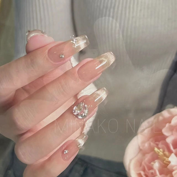 Artistic Stiletto Press-On Nail Set with Unique Design Elements Bowlift