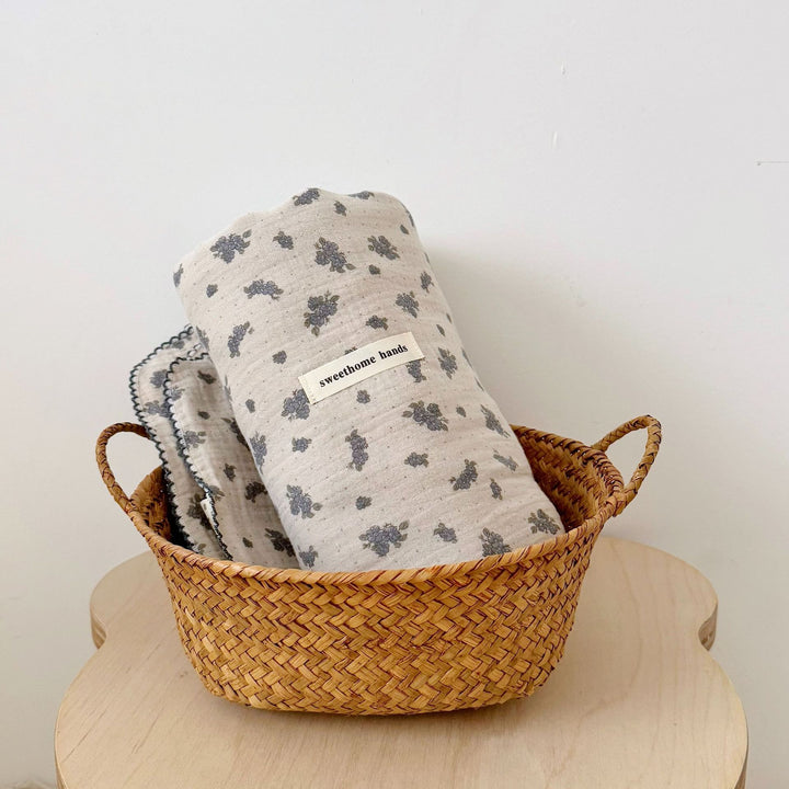Unisex Muslin Blanket with delicate floral design and elegant ruffles Bowlift