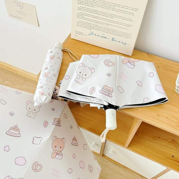 Women's foldable umbrella with playful animal motif Bowlift