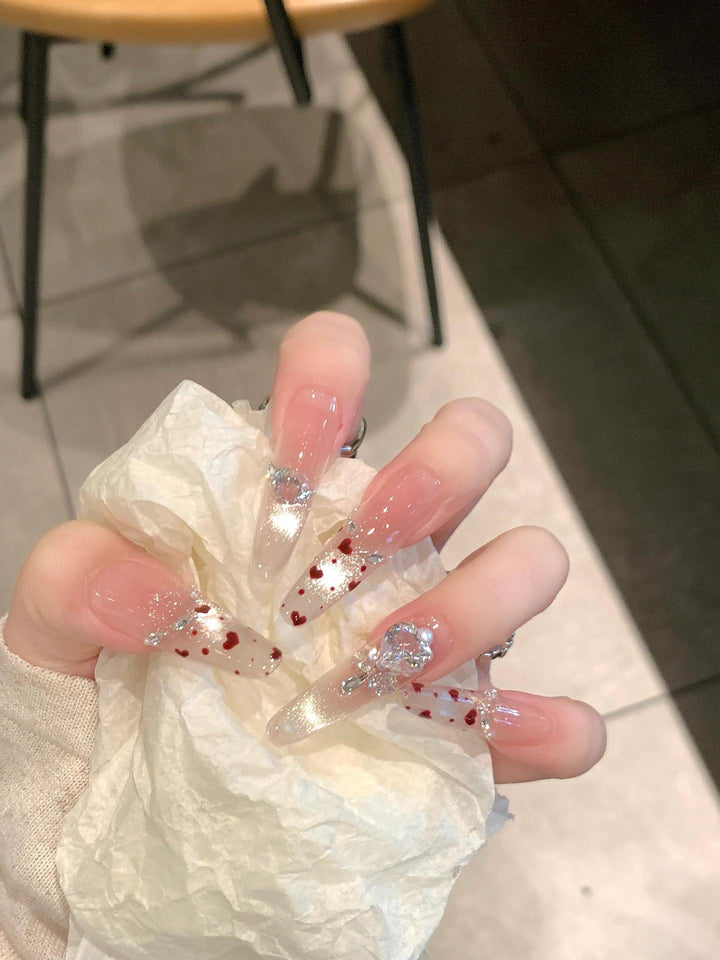 Nail art set with sparkling rhinestones and heart design Bowlift
