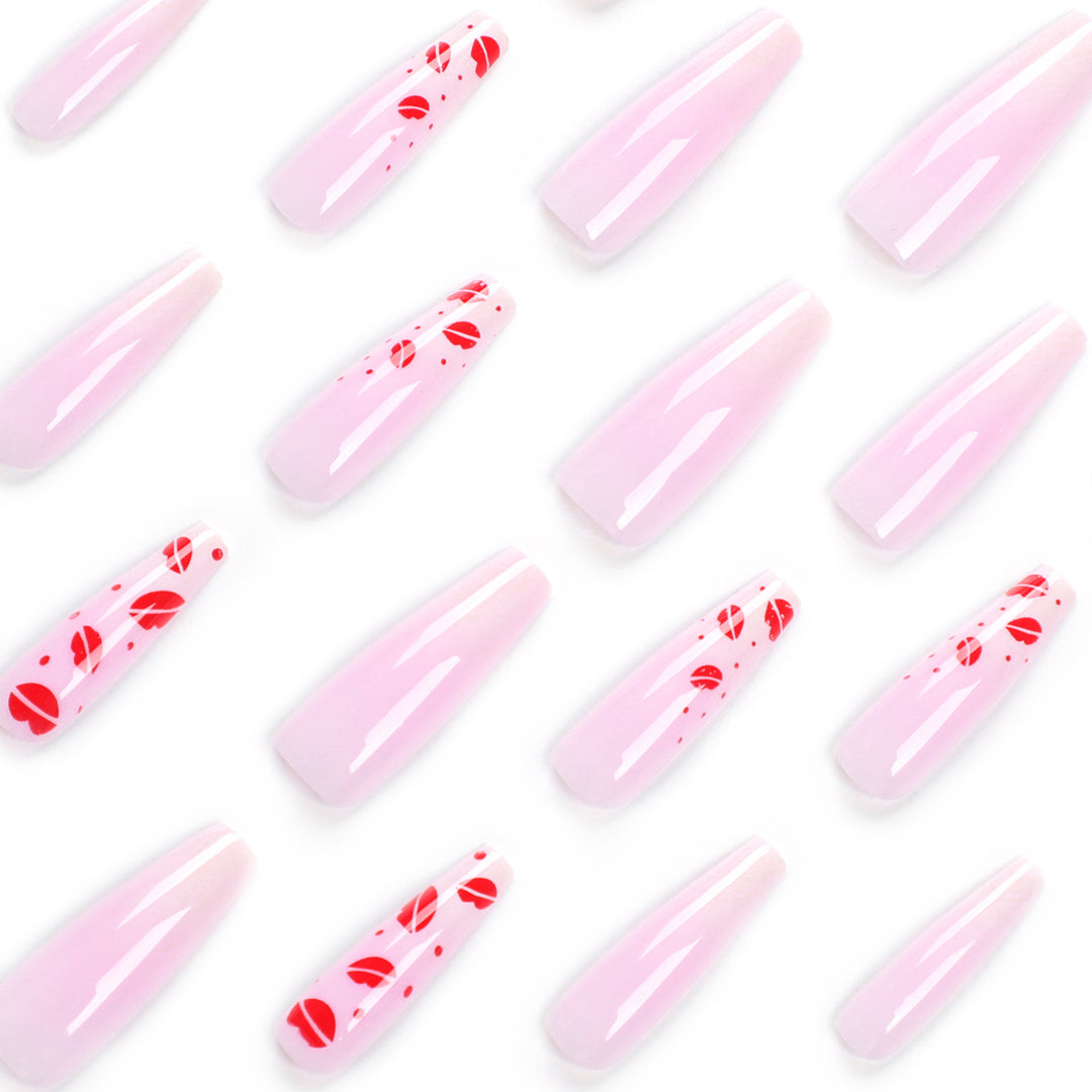 Artistic stiletto nails with lip motifs Bowlift