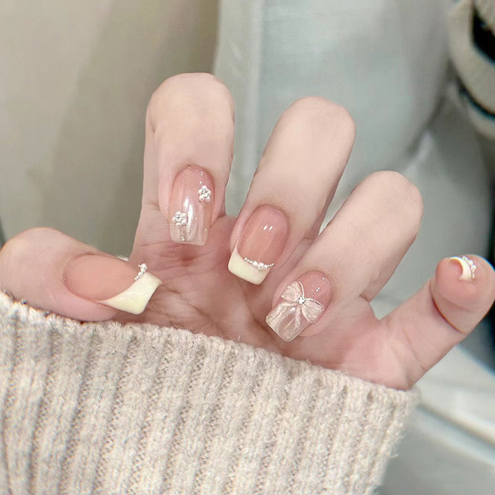 Artistic Nail Extensions with Decorative Elements Bowlift