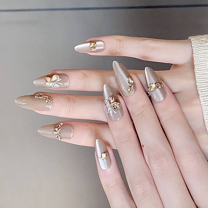 Decorative Stiletto Press-On Nails with Rhinestone Embellishments Bowlift