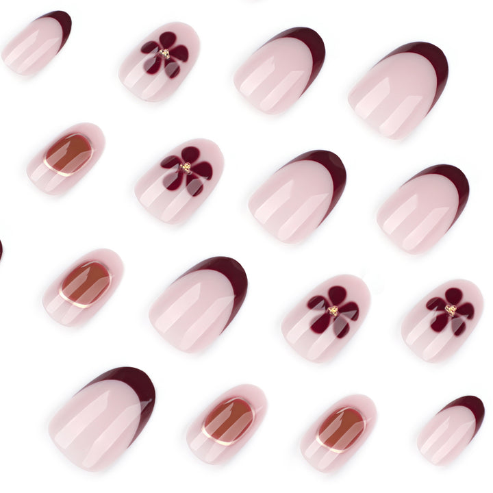 Elegant Nail Art with Floral Accents and Golden Details Bowlift