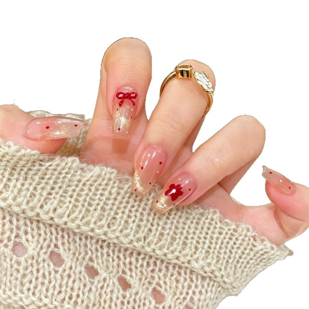 Artificial nails with sparkling accents and delicate patterns Bowlift