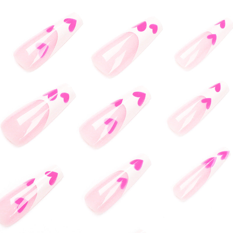 Artful Stiletto Nails with Hearts Design Bowlift