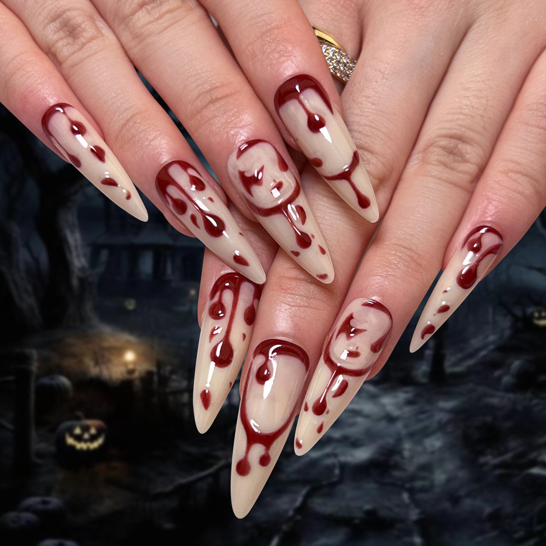 Creative Stiletto Nail Art with Blood Red Accents Bowlift