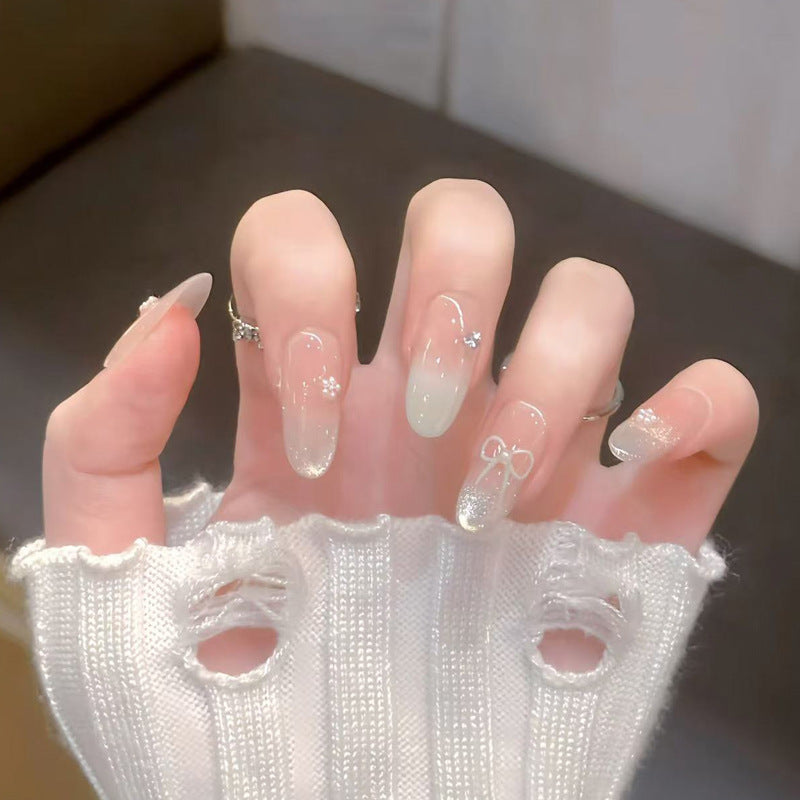 Artistic Press-On Nail Set with Bow and Floral Details Bowlift