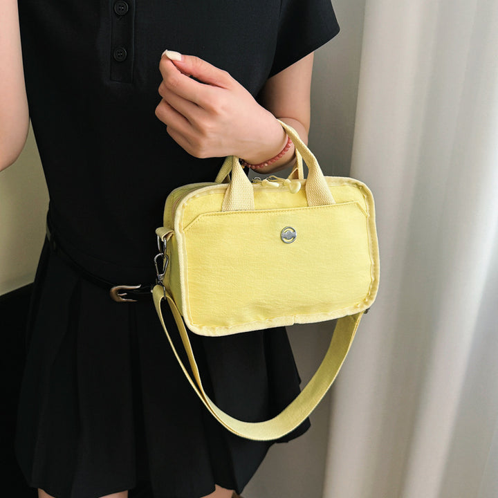 Tote bag with adjustable shoulder strap and extra storage Bowlift