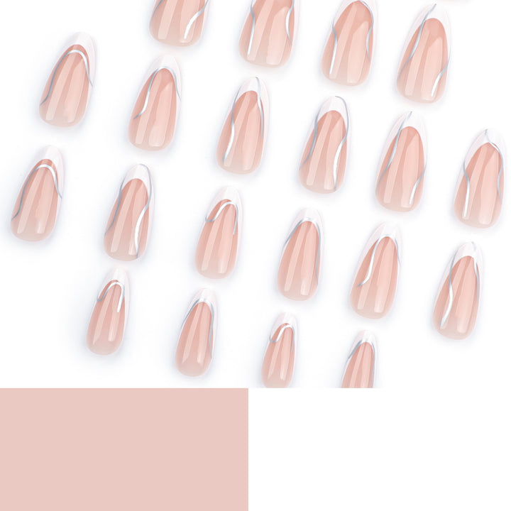 Elegant artificial nails with fine wave and glitter motifs Bowlift