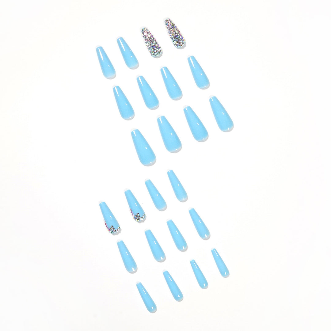 Artful Stiletto Nails with Radiant Rhinestone Accent Bowlift