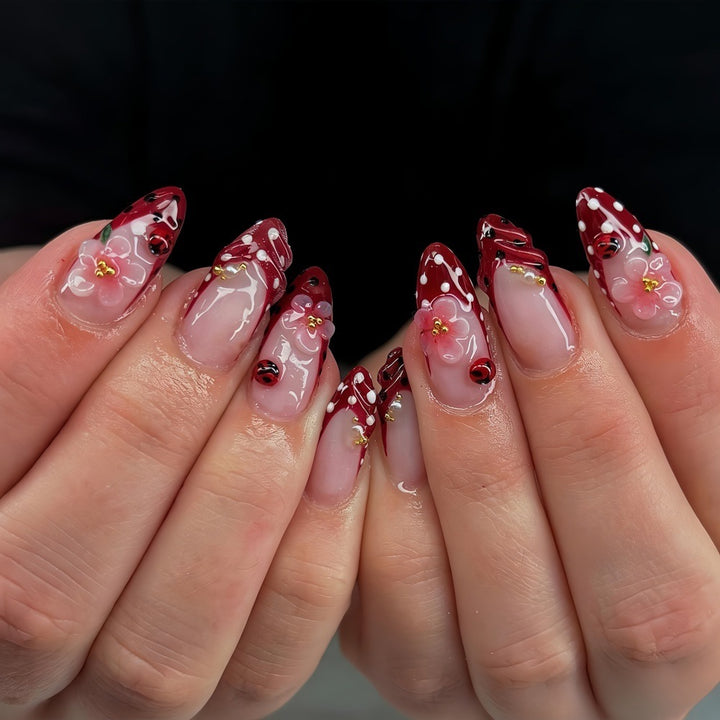Creative tip design artificial nails with floral accents Bowlift