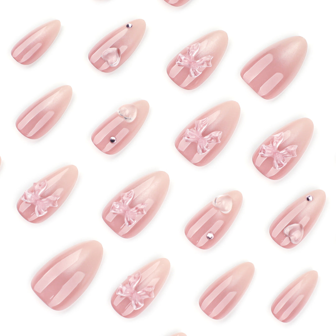 Artful stiletto nails with floral design and glitter accents Bowlift