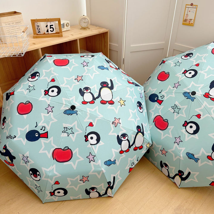 Ladies collapsible umbrella with playful penguin design Bowlift