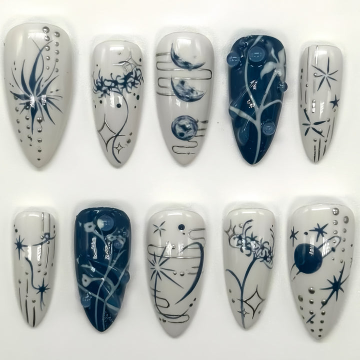 Artistic Long Stiletto Press-On Nails with Decorative Accents Bowlift