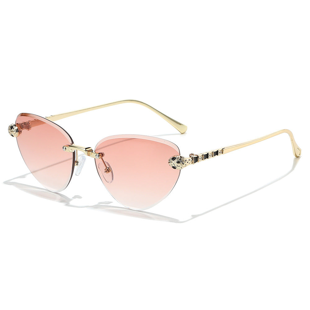 Designer Cat-Eye Sunglasses with Decorative Accents Bowlift