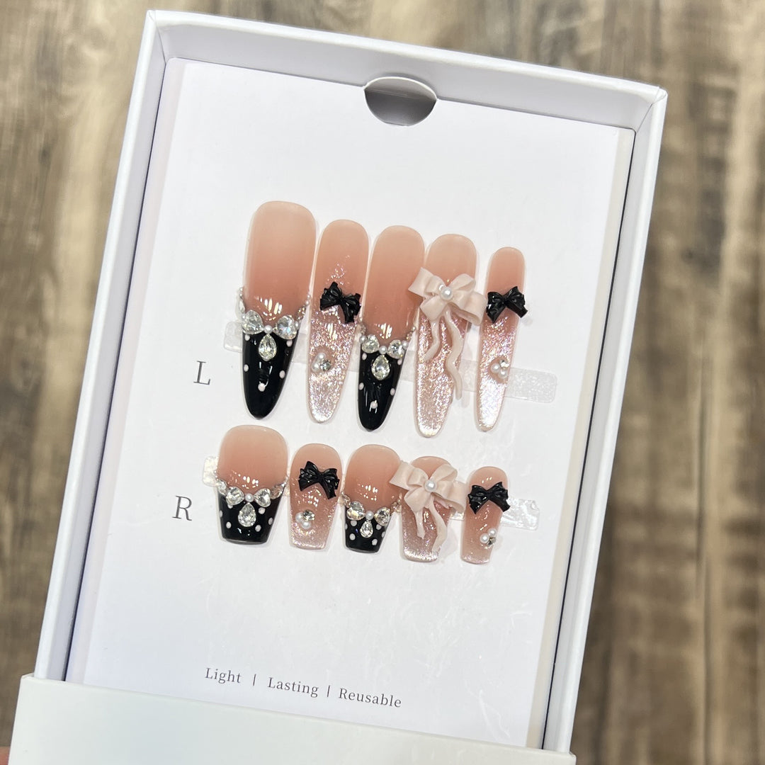 Glamorous Stiletto Press-On Nail Set with Decorative Bow and Gemstone Accents Bowlift
