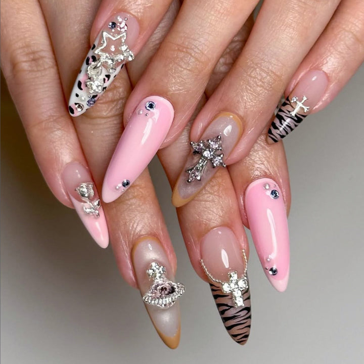 Artful stiletto nails with glitter and rhinestone embellishments Bowlift