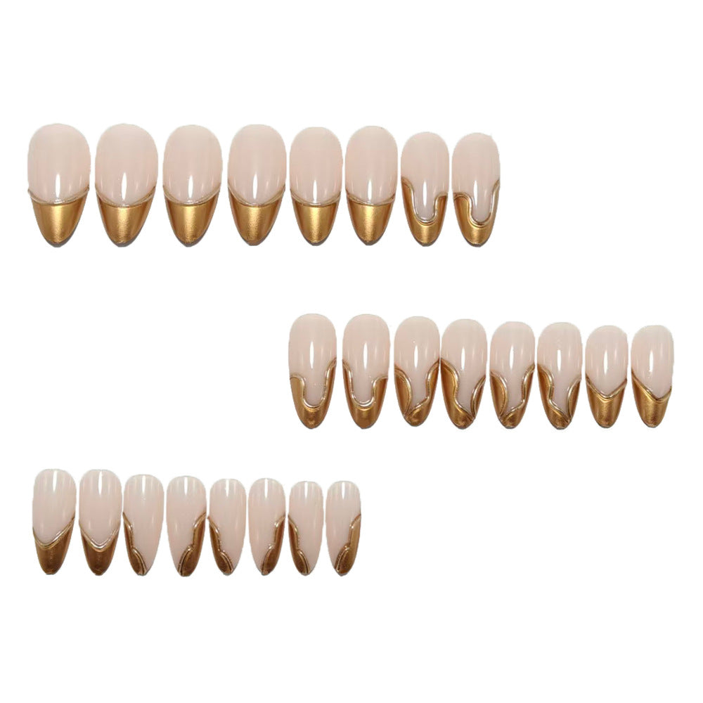 Artificial nails in elegant stiletto design with gold accents Bowlift